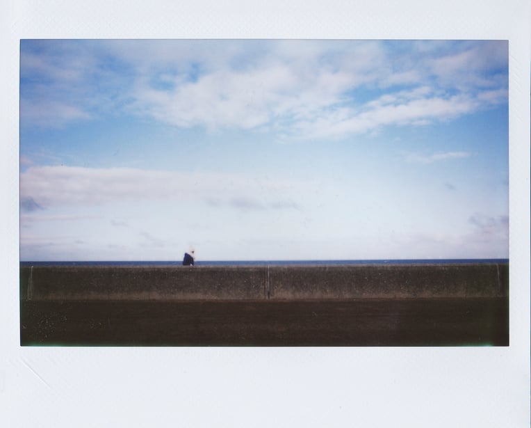 Polaroid Photo of a Wall near the Beach